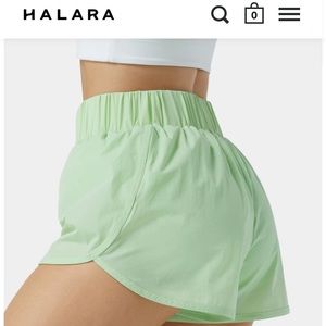 Halara High Rise Dolphin-Hem Run Shorts